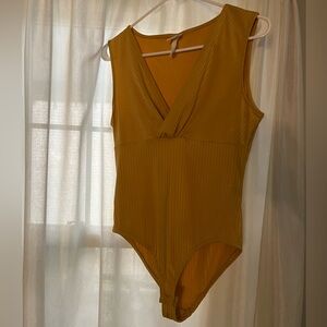 Gold bodysuit